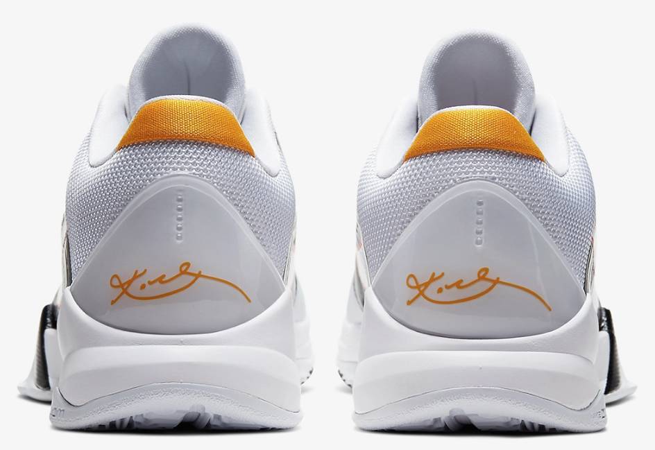 Kobe 5 鞋跟的TPU穩定板上印有黃色的Kobe Bryant簽名作點綴。